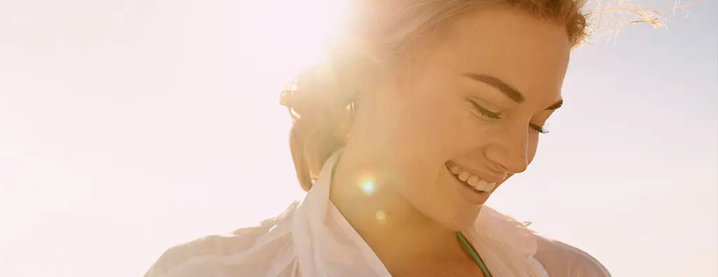 Woman smiling on a sunny day