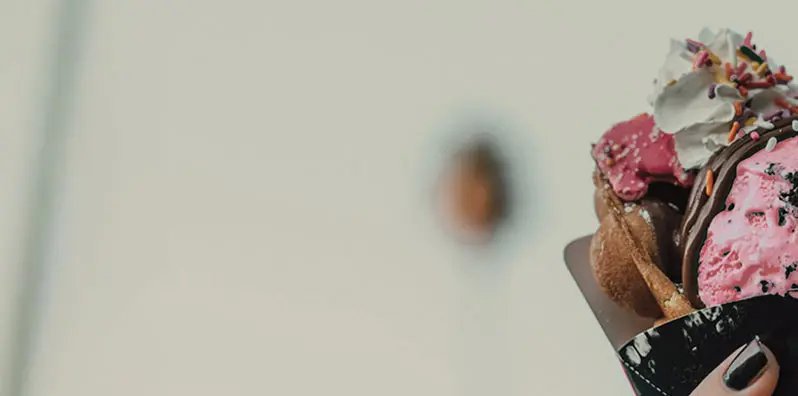 Woman holding an ice cream cone (2 of 4)